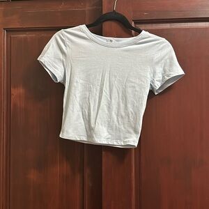 Light blue cropped shirt